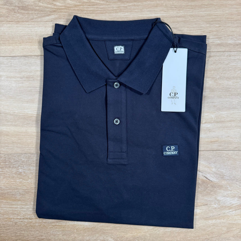 CP Company Stretch Piquet Logo Polo Shirt in Black Sand Ironleague