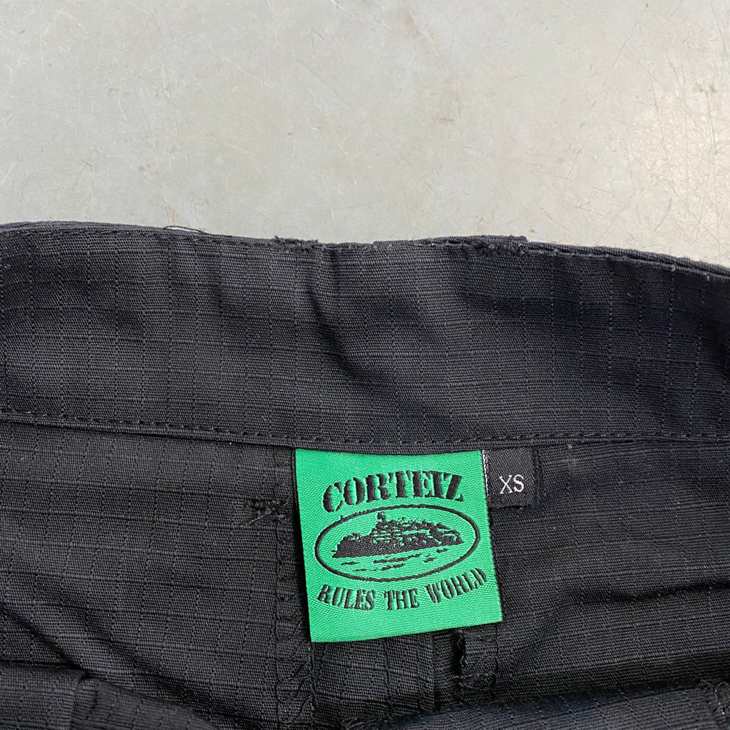 Corteiz Mula Guerrillaz Shorts - Black/Green Ironleague