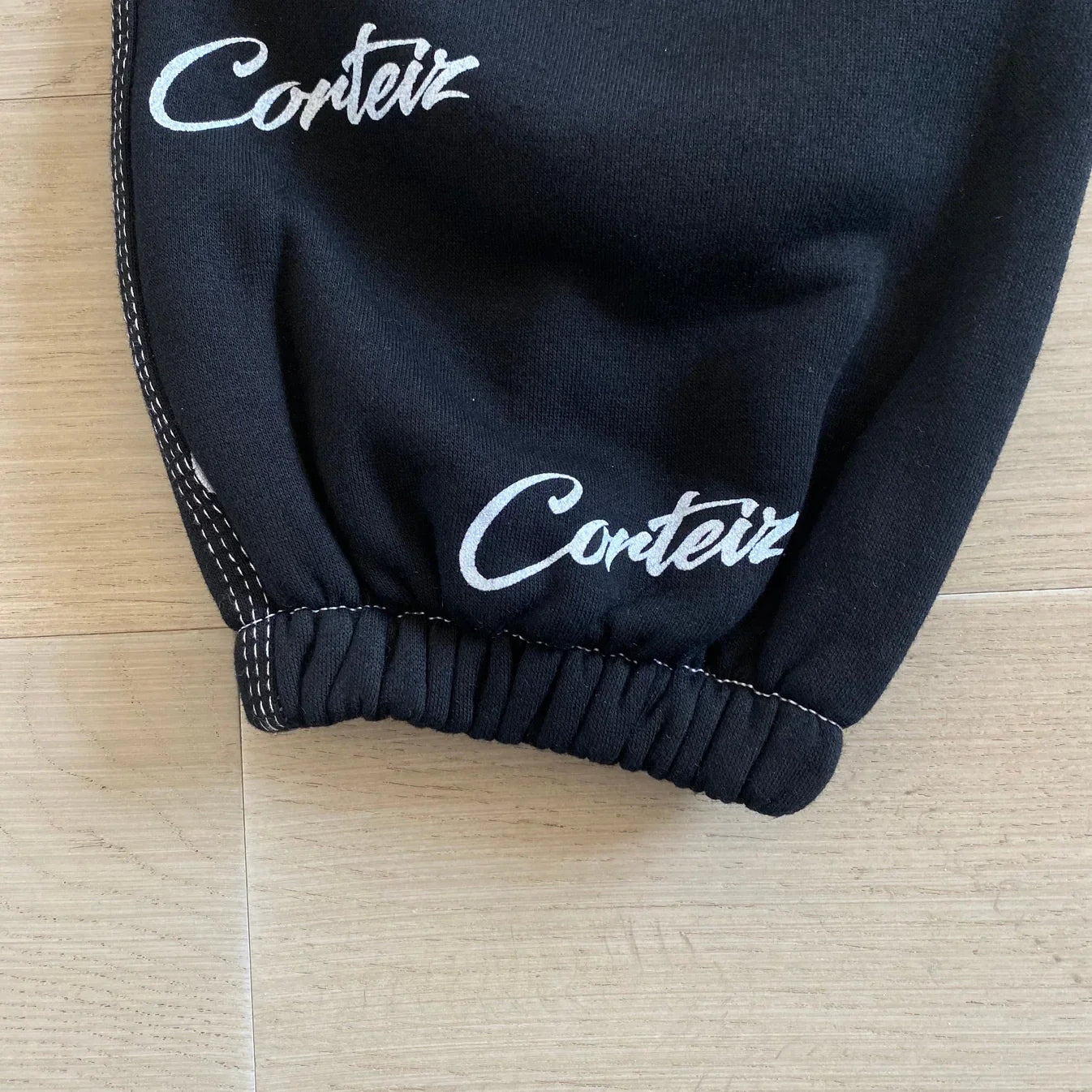 Corteiz All Over Print Joggers - Black/White Ironleague