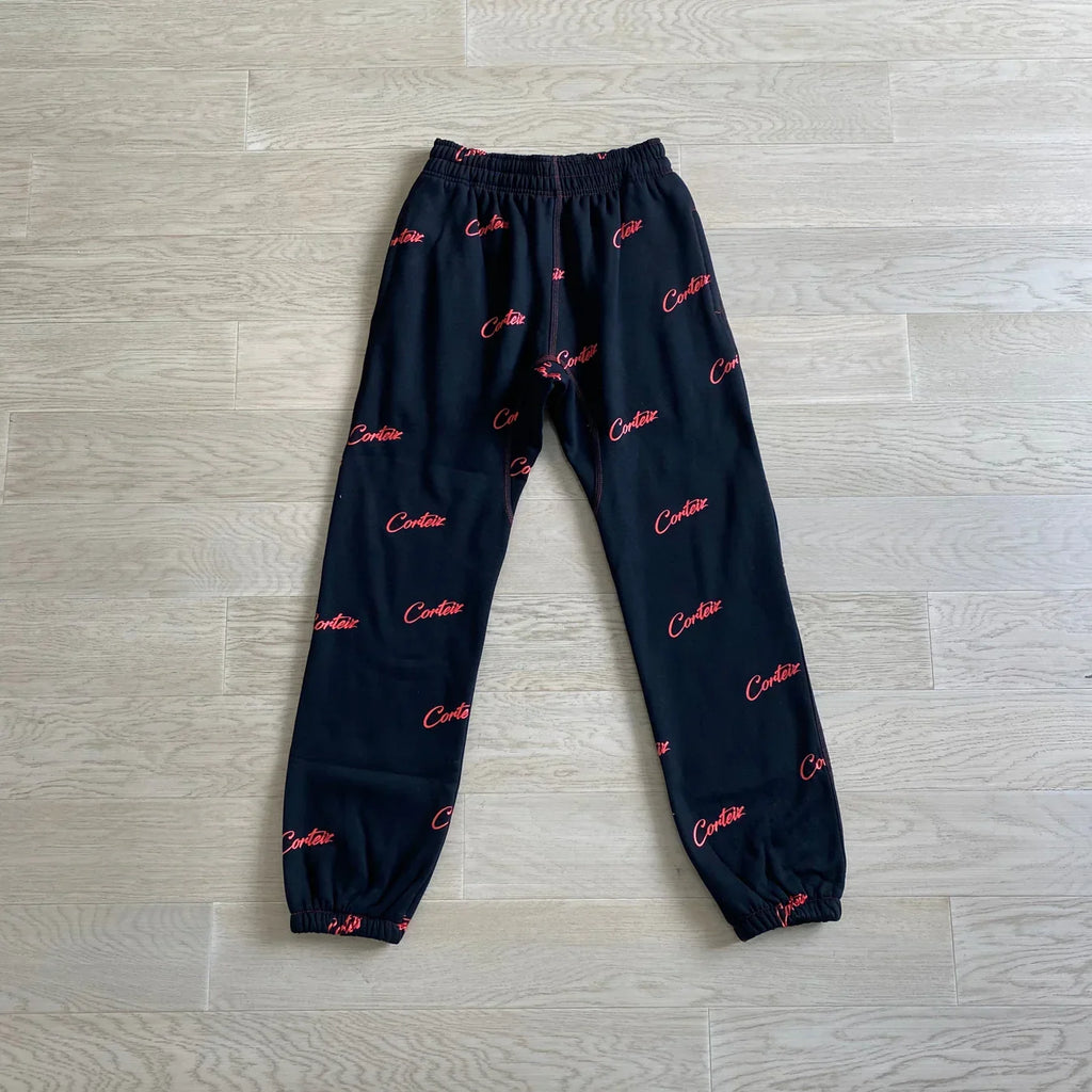 Corteiz All Over Print Joggers - Black/Red Ironleague