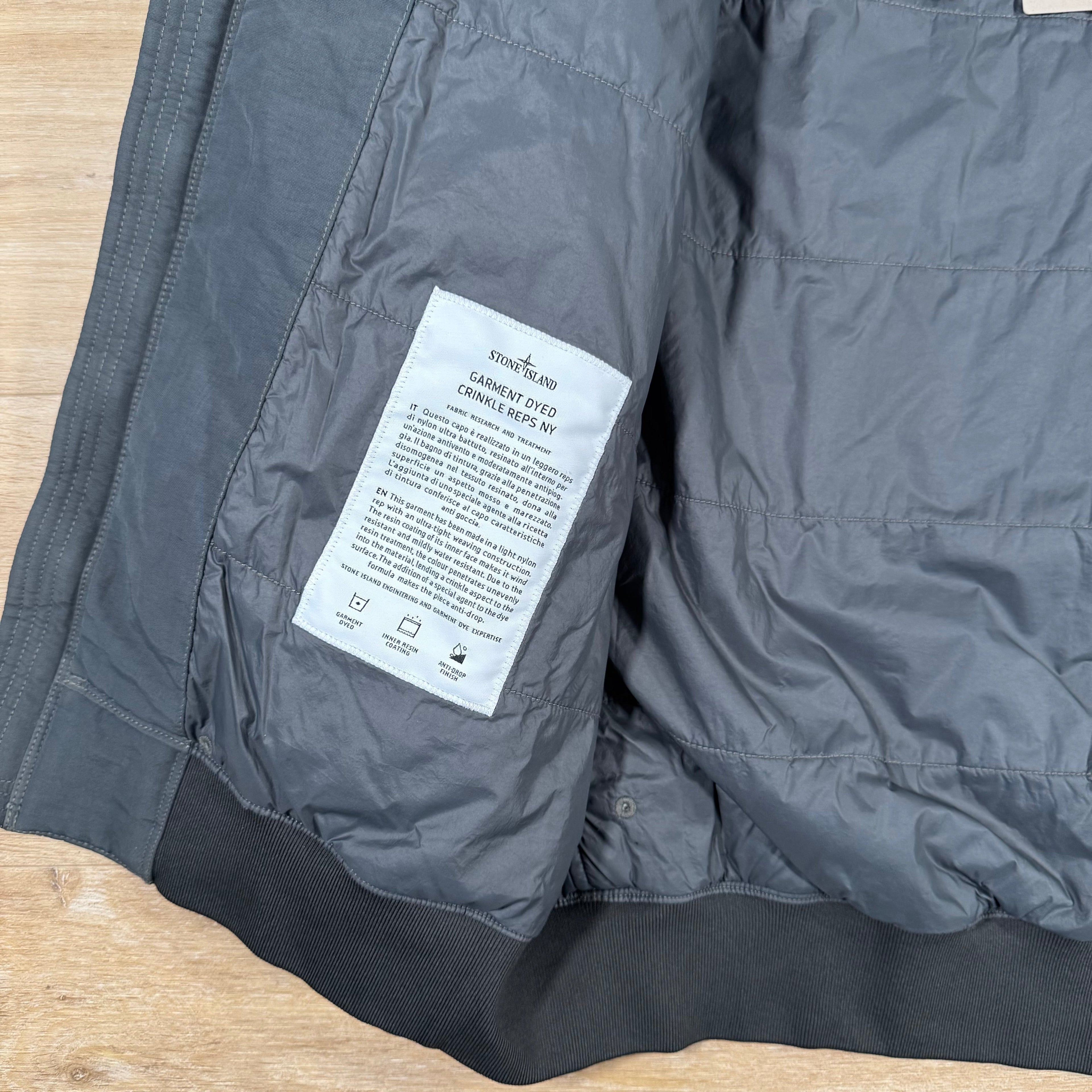 Stone Island Crinkle Reps NY Padded Jacket in Lead Grey Ironleague
