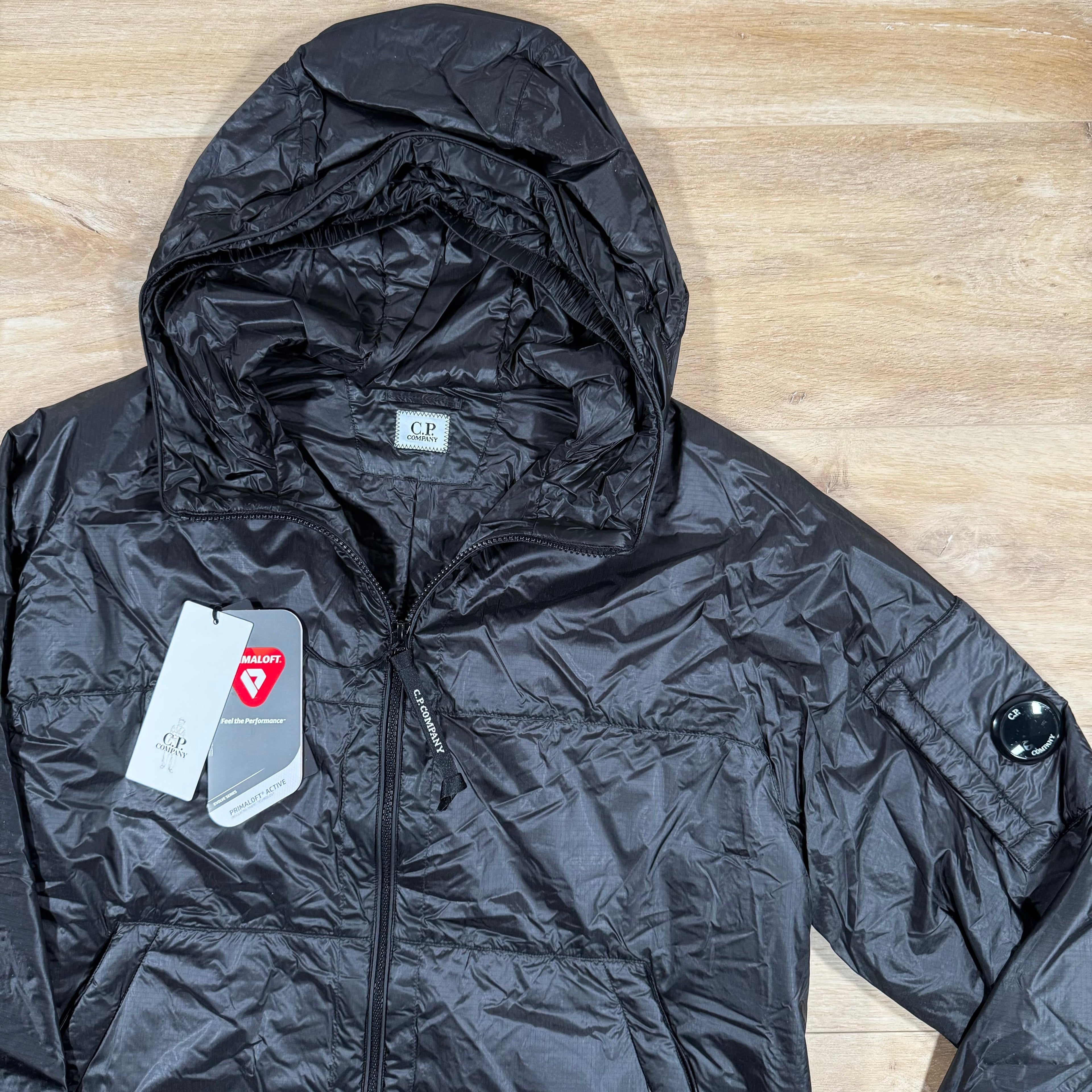CP Company Nada Shell Lens Padded Jacket in Black Ironleague