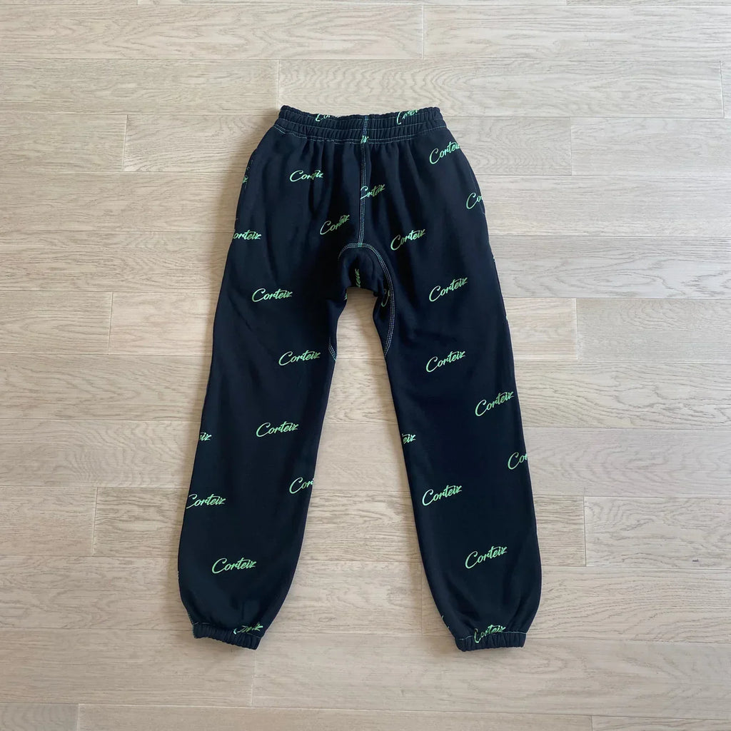 Corteiz All Over Print Joggers - Black/Green Ironleague