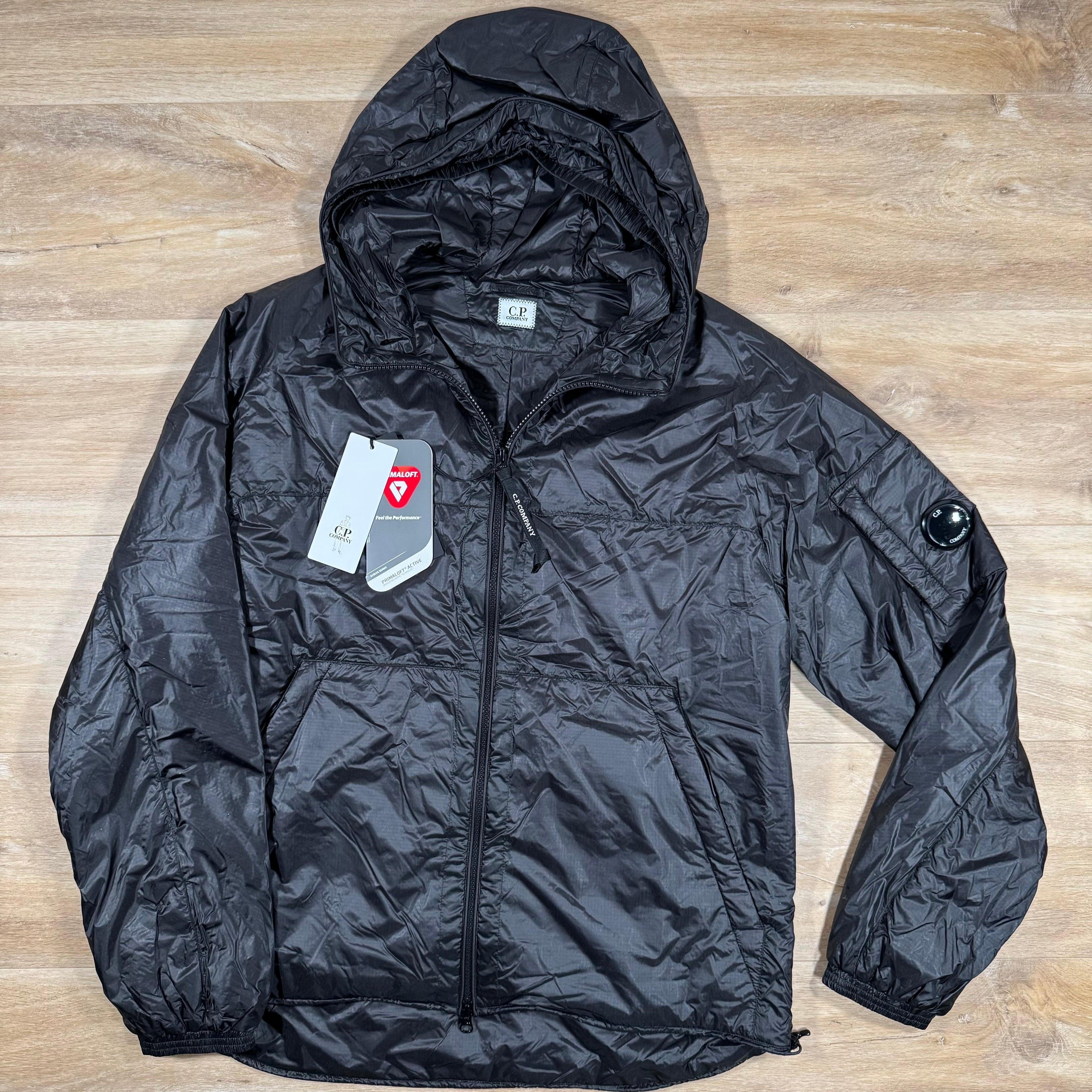 CP Company Nada Shell Lens Padded Jacket in Black Ironleague