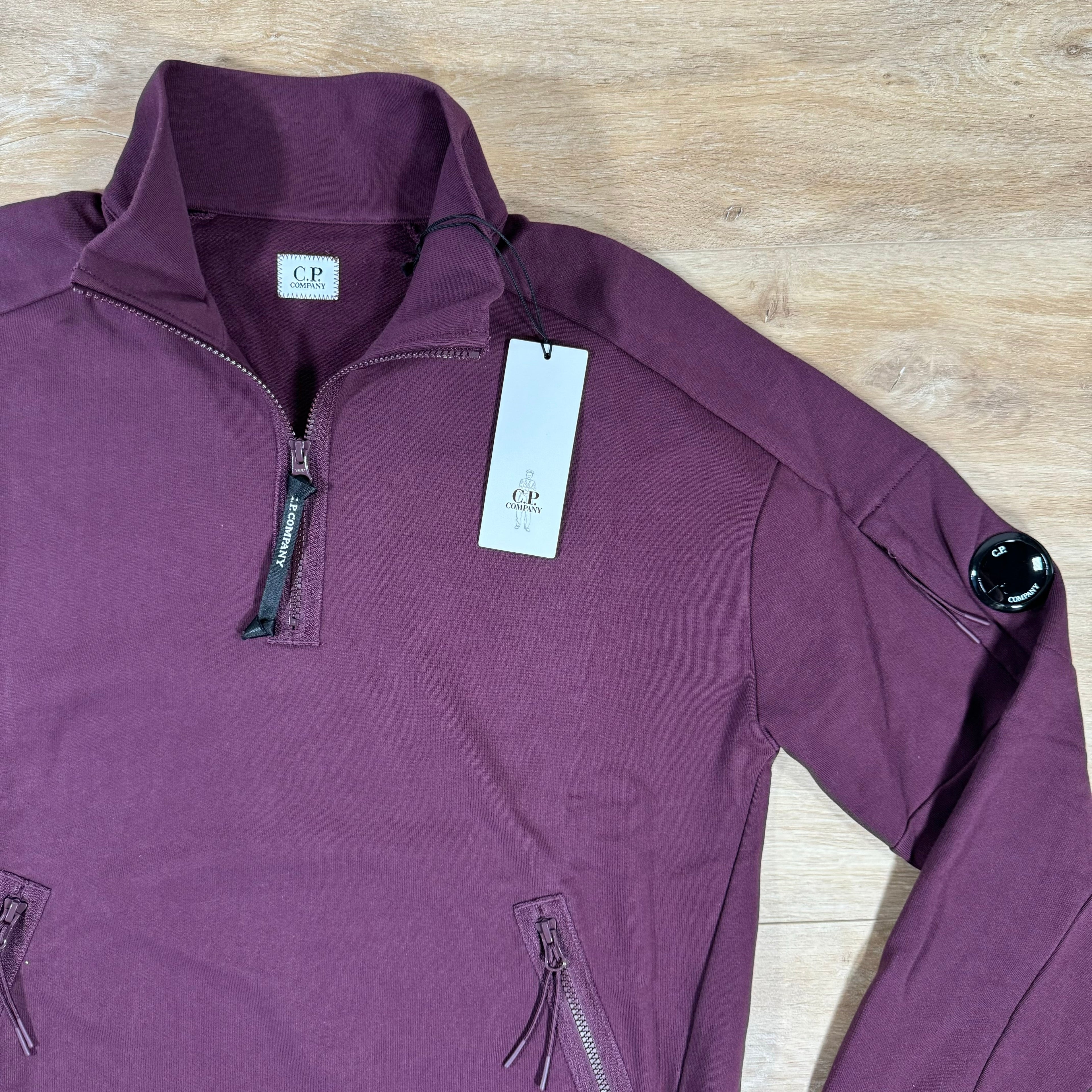 CP Company Diagonal Raised Half-Zipped Lens Sweatshirt in Potent Purple Ironleague