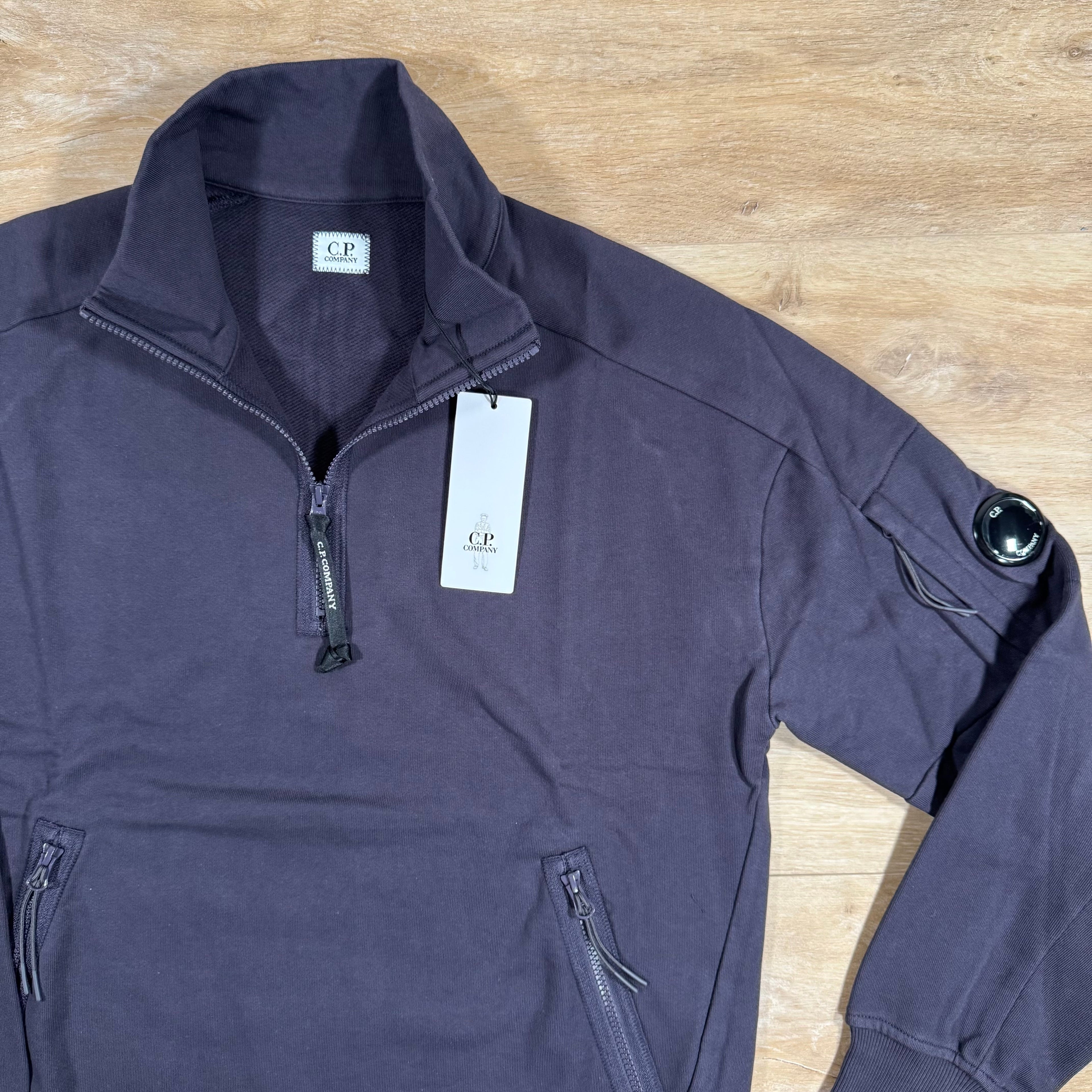 CP Company Diagonal Raised Half-Zipped Lens Sweatshirt in Nightshade Purple Ironleague
