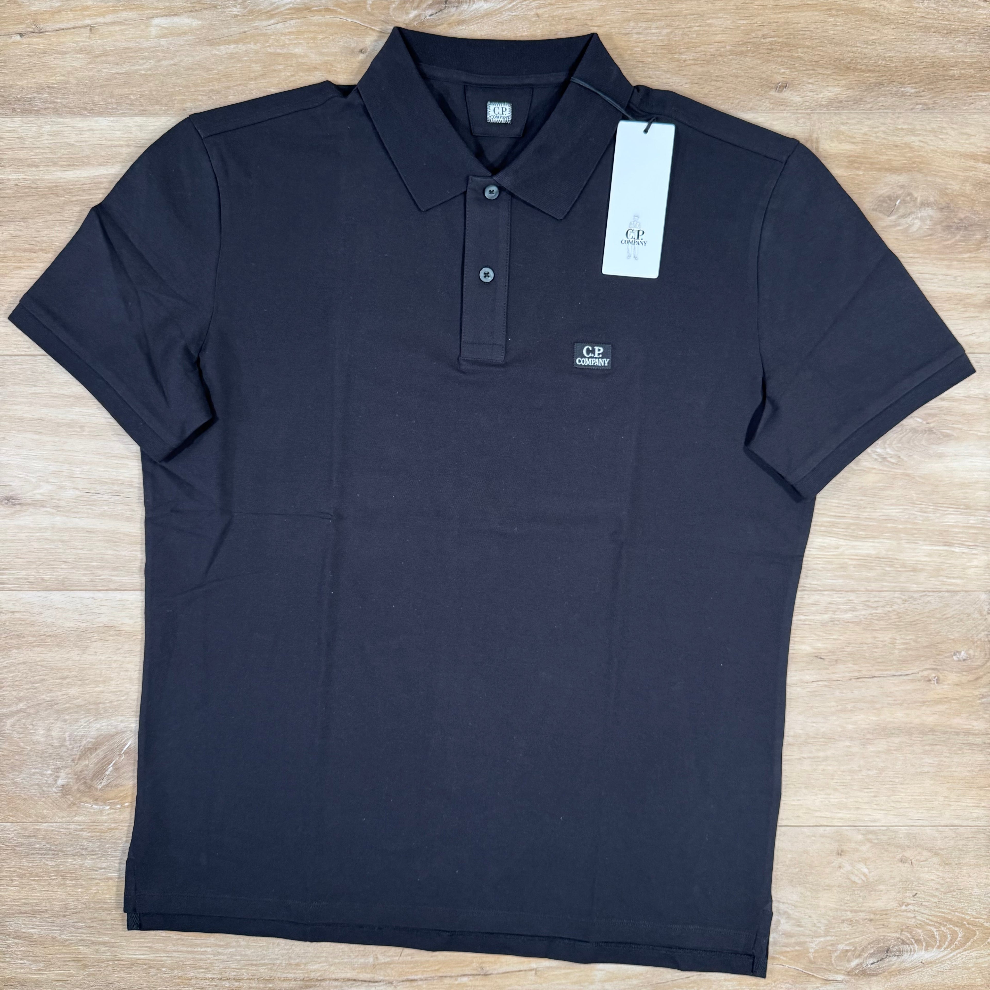 CP Company Stretch Piquet Logo Polo Shirt in Black Ironleague