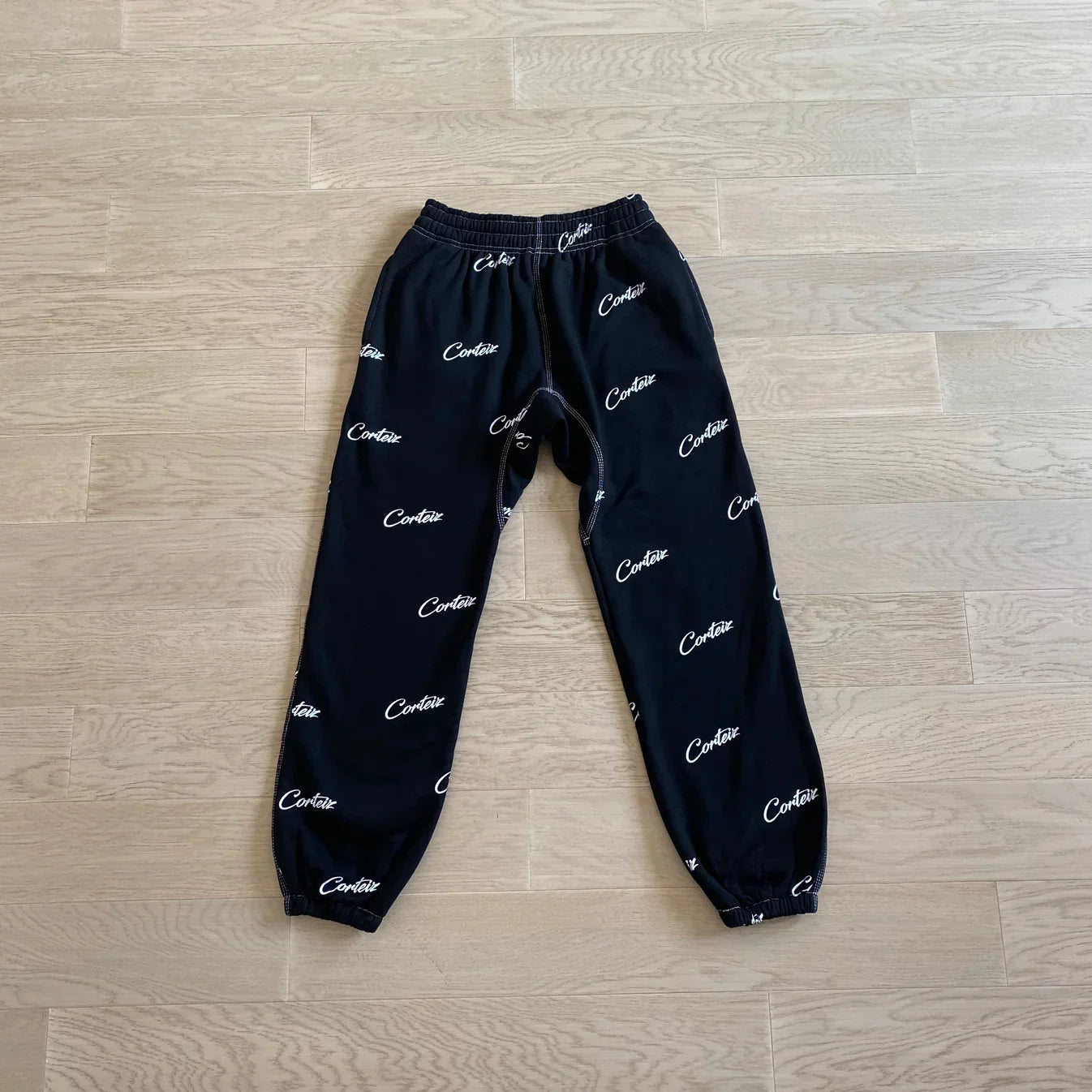 Corteiz All Over Print Joggers - Black/White Ironleague