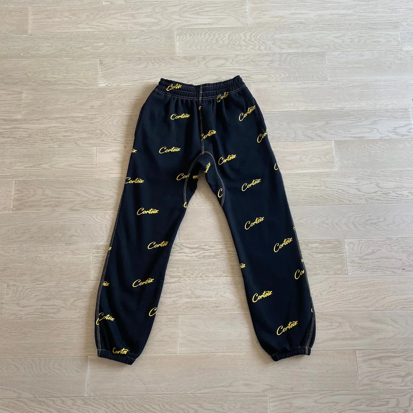 Corteiz All Over Print Joggers - Black/Yellow Ironleague