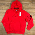 CP Company Diagonal Raised Fleece Lens Hoodie in Poinciana Orange Ironleague