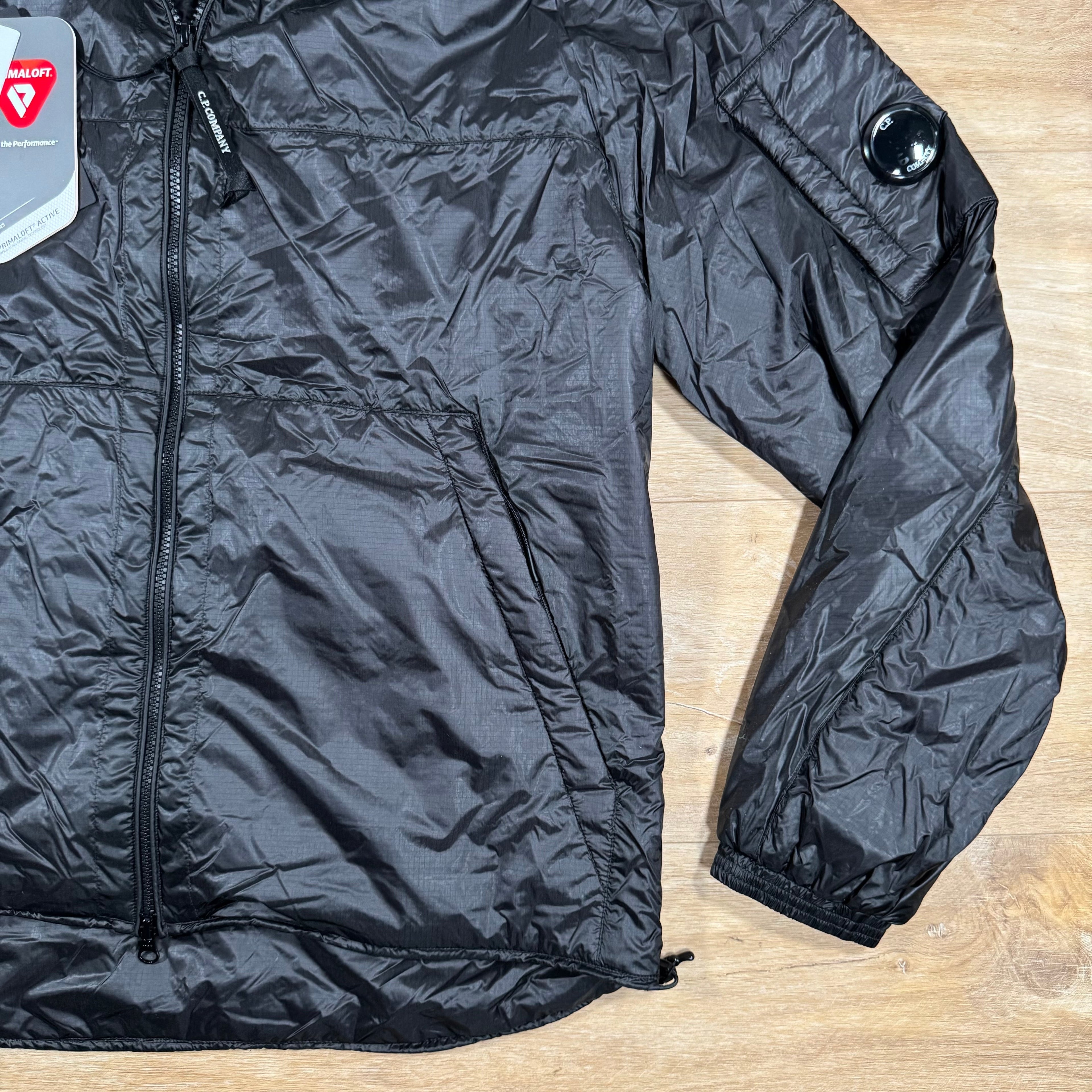 CP Company Nada Shell Lens Padded Jacket in Black Ironleague