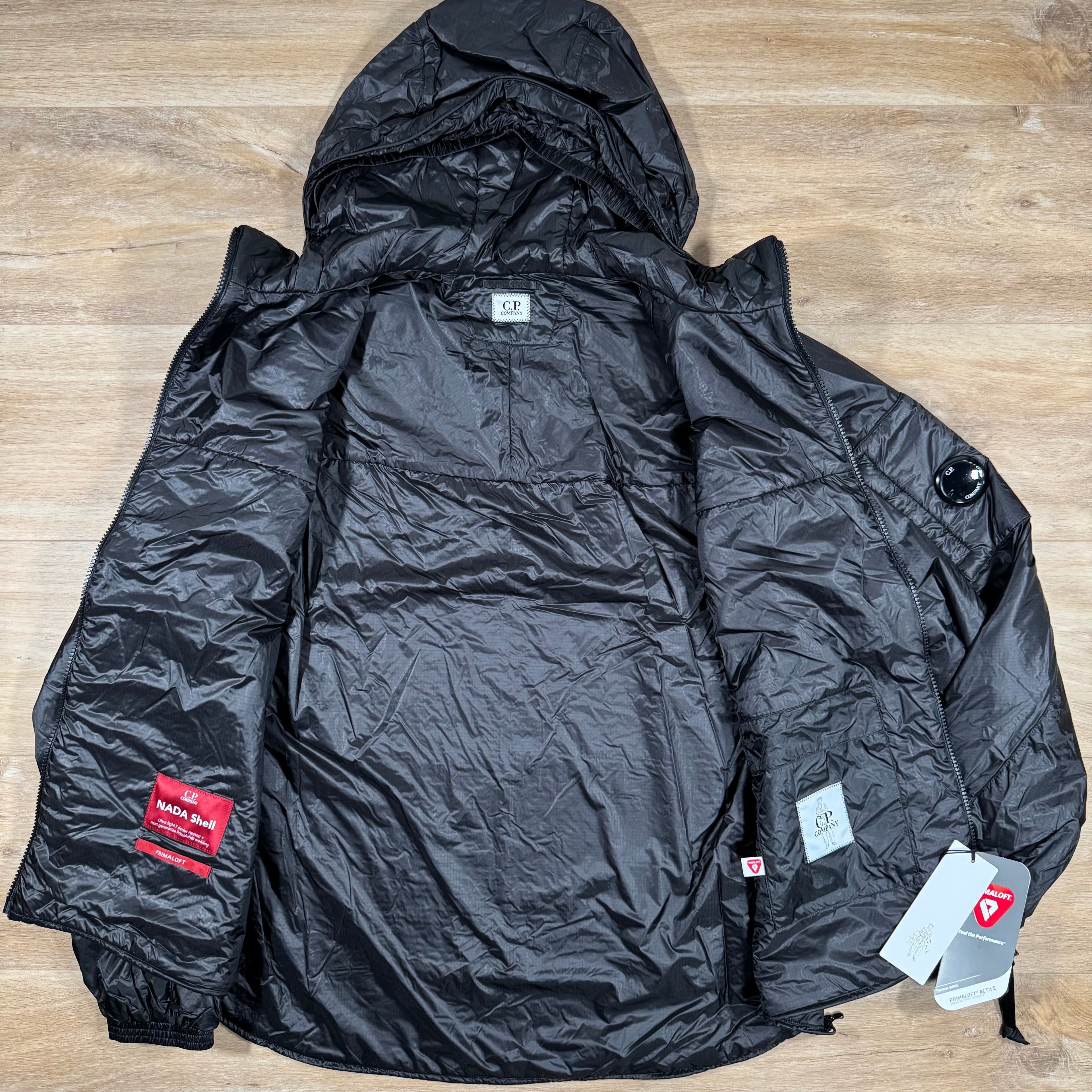 CP Company Nada Shell Lens Padded Jacket in Black Ironleague