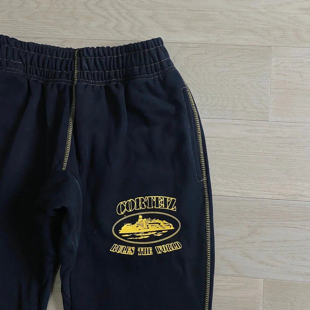 Corteiz Alcatraz Jogging Pants - Black/Yellow Ironleague