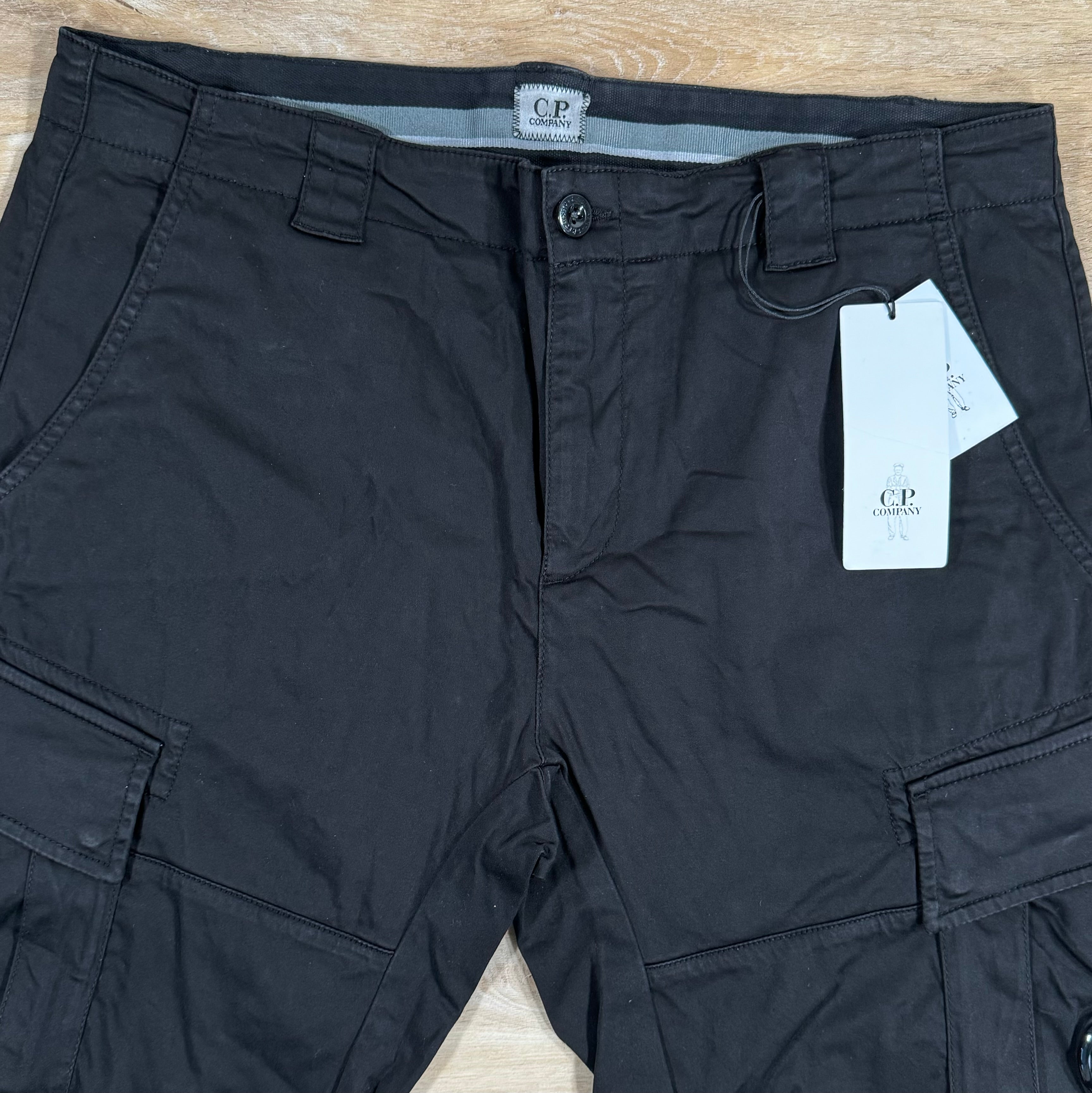 CP Company Stretch Sateen Lens Cargo Shorts in Black Ironleague