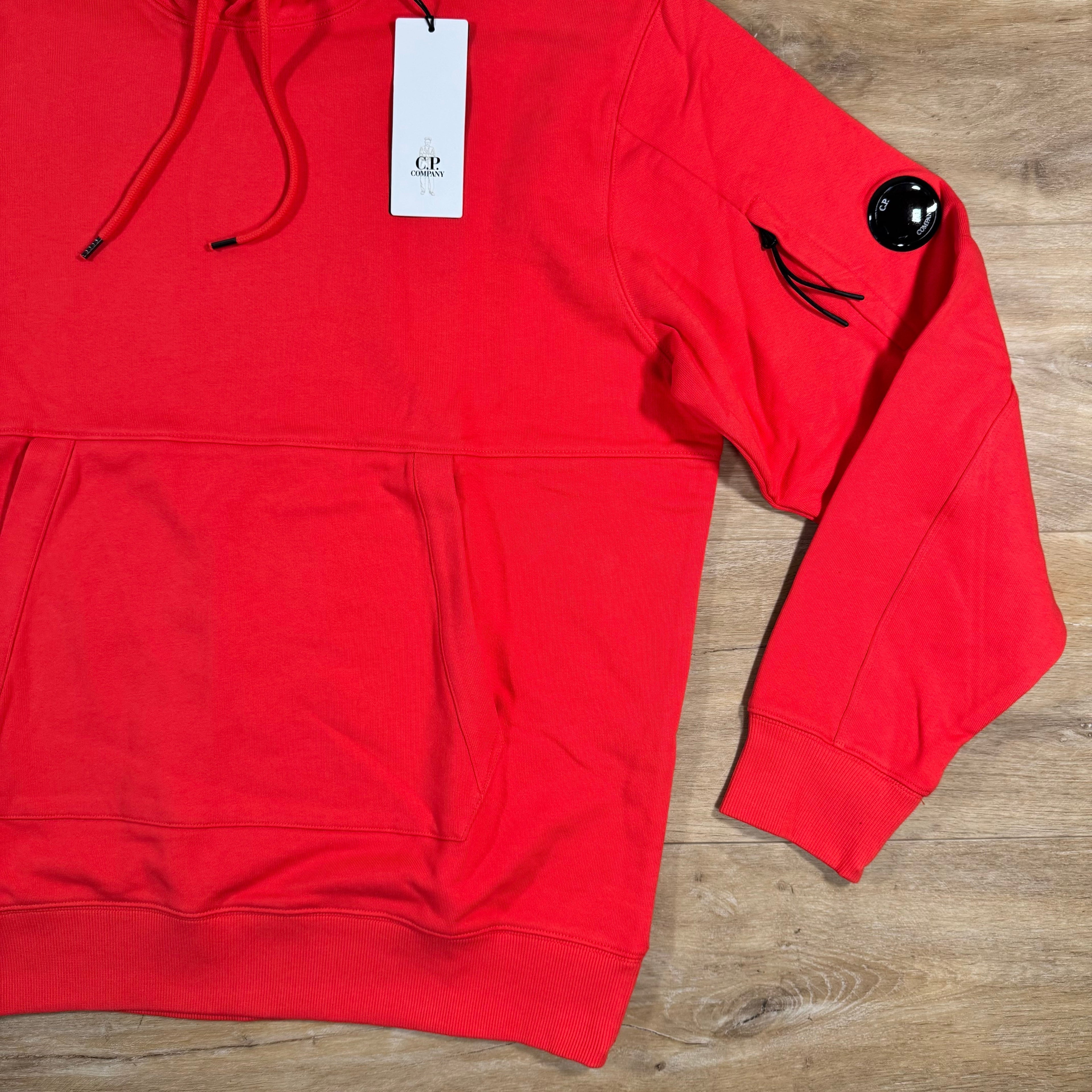 CP Company Diagonal Raised Fleece Lens Hoodie in Poinciana Orange Ironleague