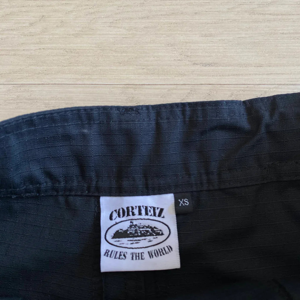 Corteiz Island Cargo Pants - Black/White Ironleague