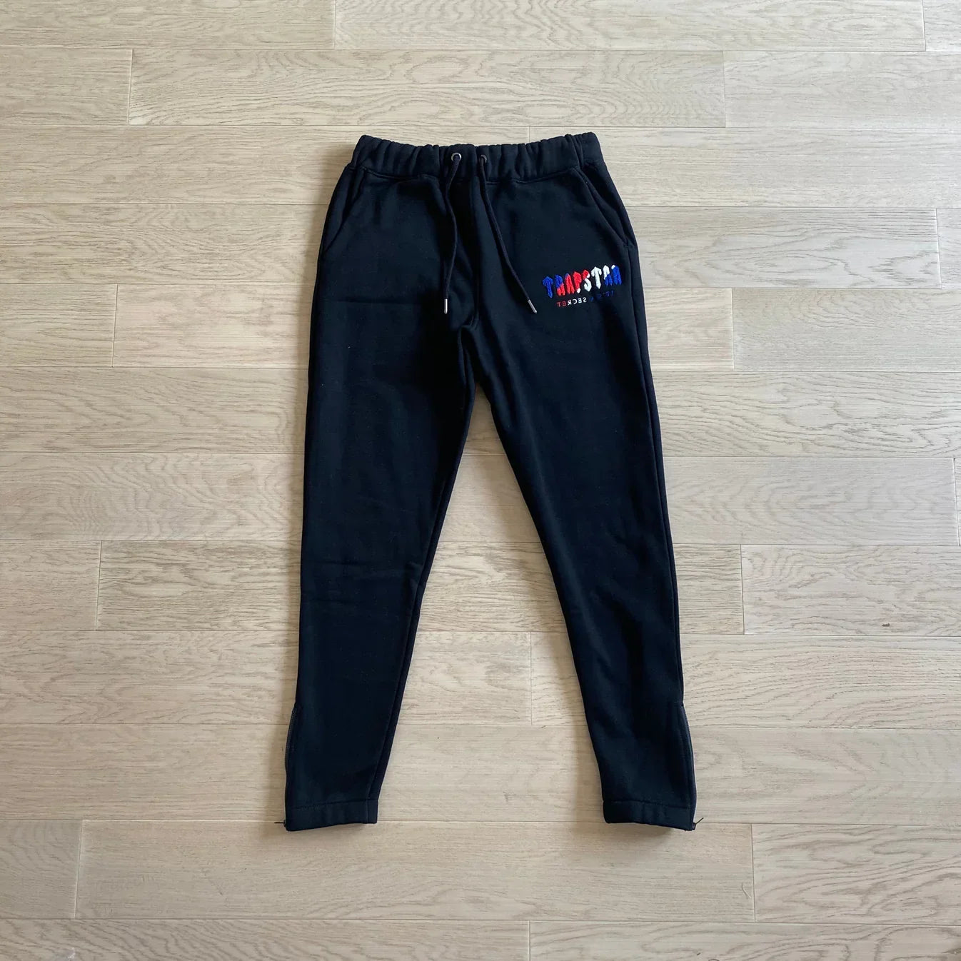 Trapstar Revolution Tracksuit - Black/Grey Ironleague