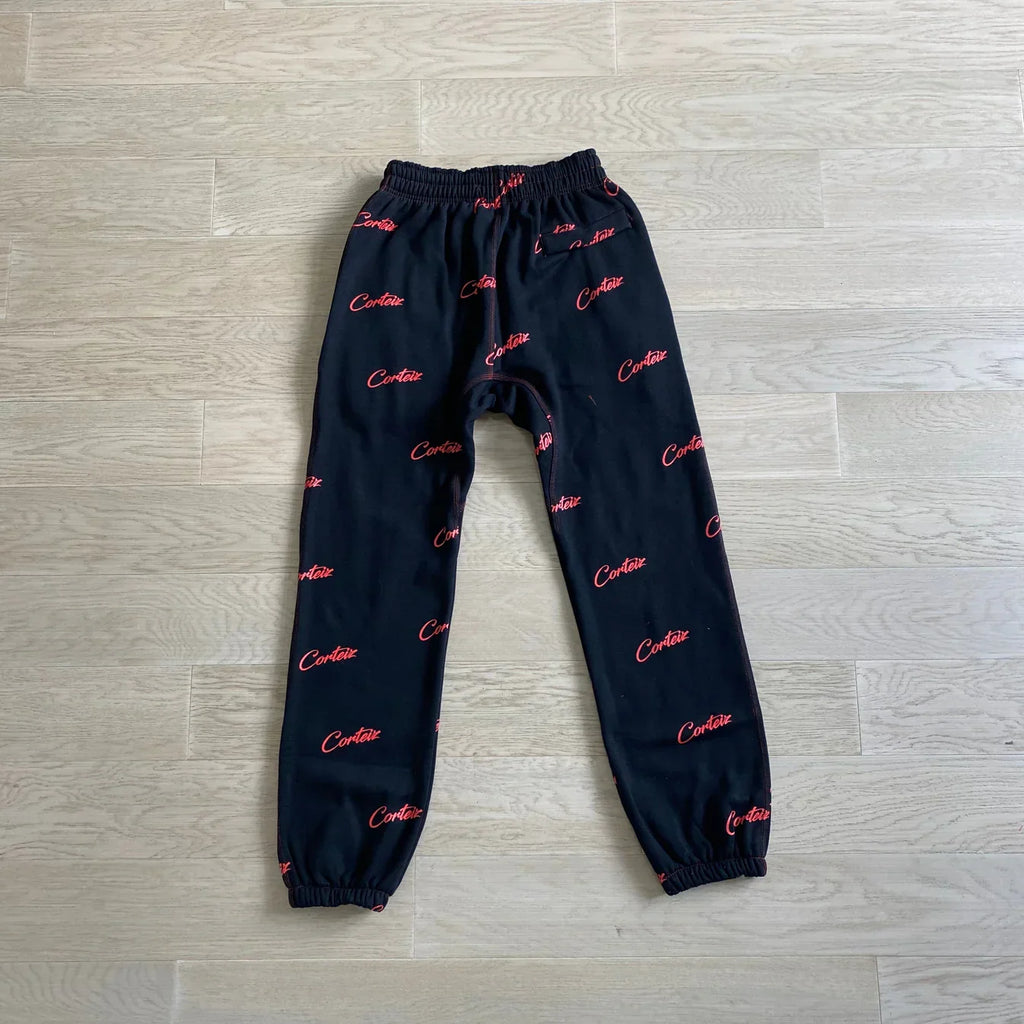 Corteiz All Over Print Joggers - Black/Red Ironleague
