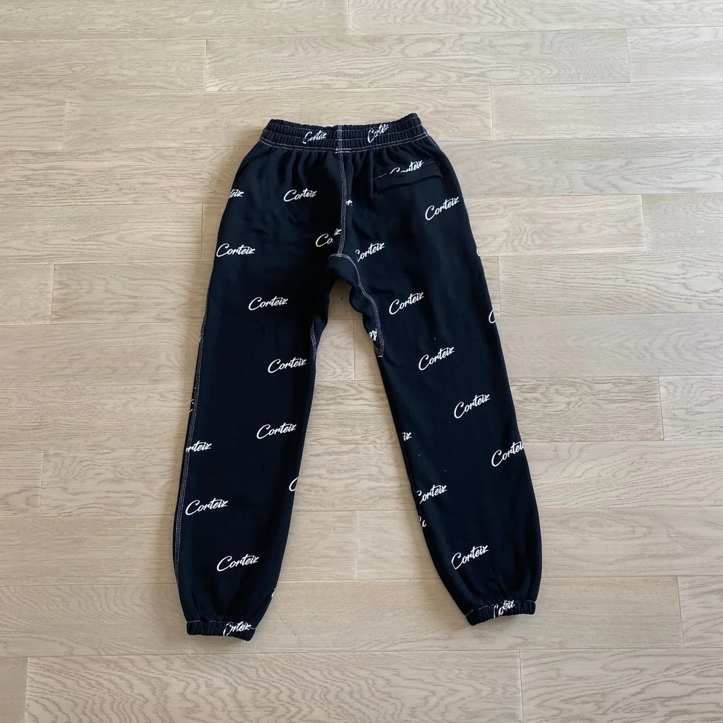 Corteiz All Over Print Joggers - Black/White Ironleague
